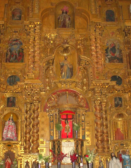 Elaborate tableau behind the altar at Templo Santiago Apostol de Yucay.
