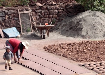 Freshly made bricks and roof tiles