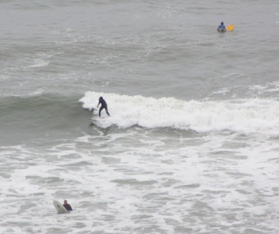 Surfers brave the waves in the height of winter