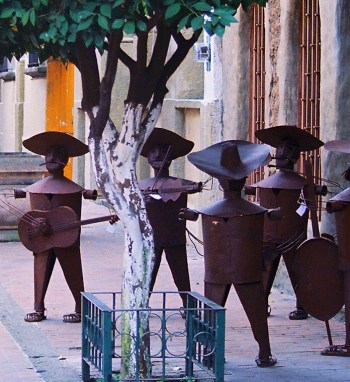 Sculpted metal mariachis silently serenade