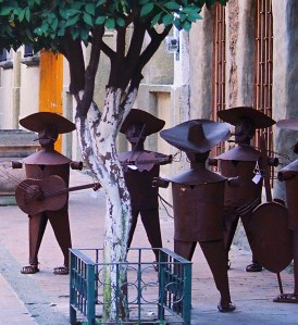 Sculpted metal mariachis silently serenade