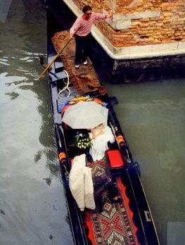 Bride and groom on gondola, Venice