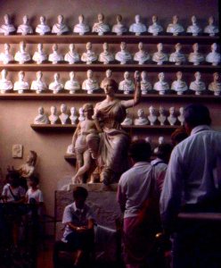 Homework sits in a sculpting workshop, FLorence, Italy.