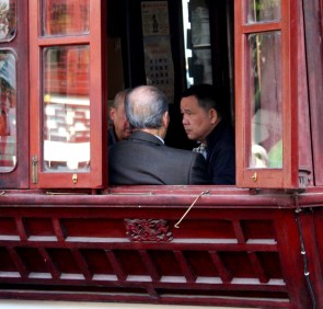 Businessmen pause over tea in Shanghai